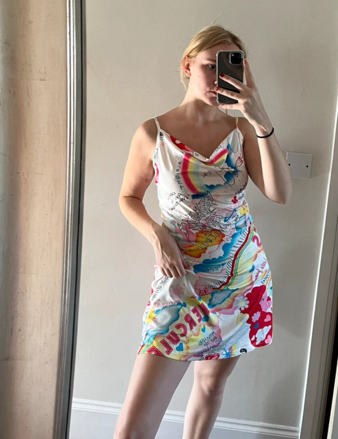 Y2K mini dress с draped cowl neckline и супер характерен цветен graphic принт в стил early-2000s pop art