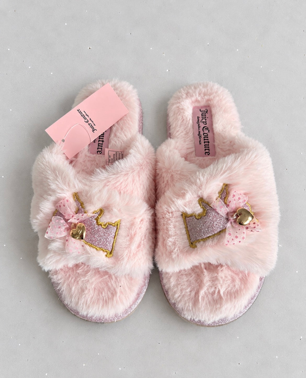 Juicy Couture пухкави розови пантофи с коронки и панделки