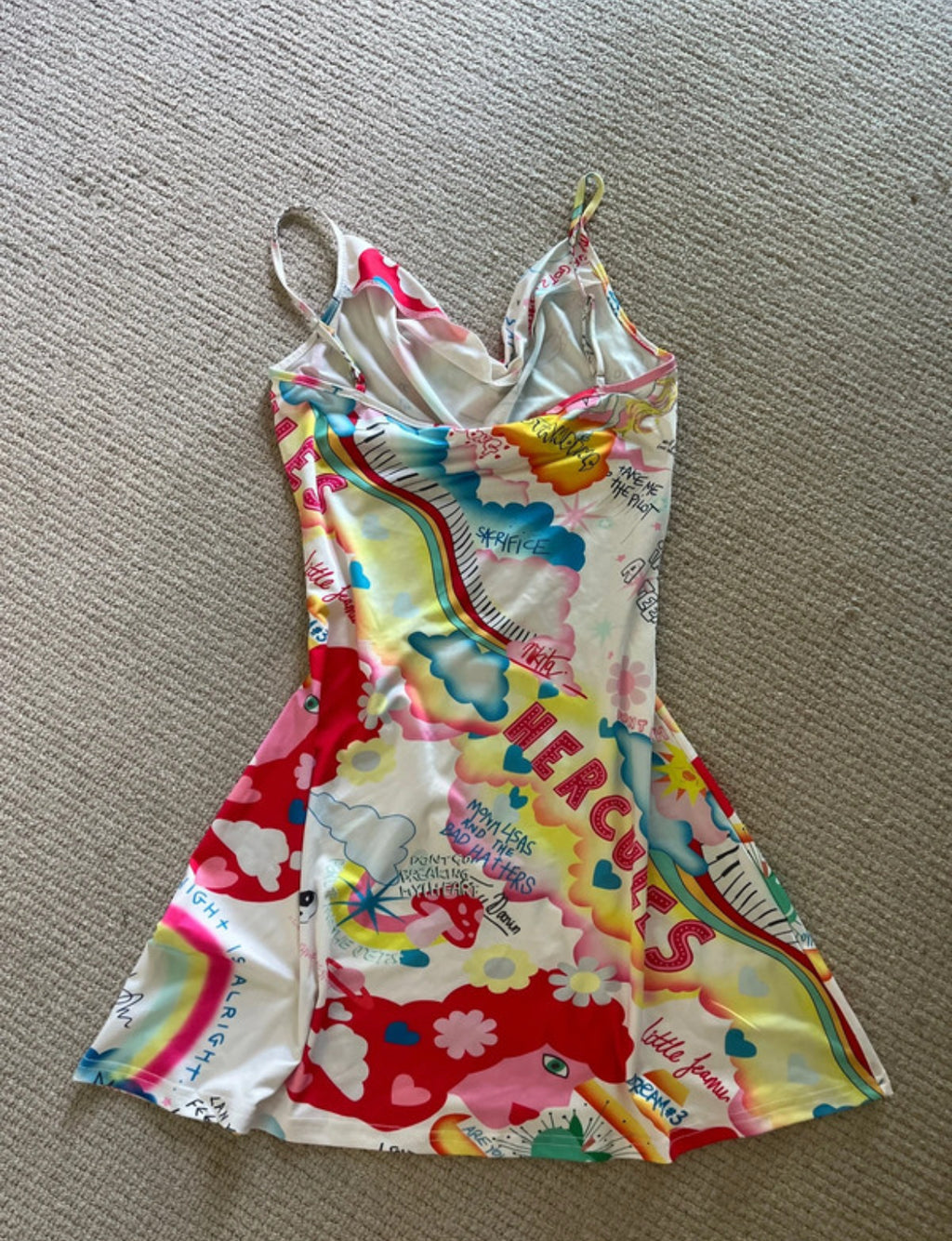 Y2K mini dress с draped cowl neckline и супер характерен цветен graphic принт в стил early-2000s pop art