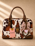 Чанта Juicy Couture Romance Cow Satchel с ефектен косъм с принт тип cow print