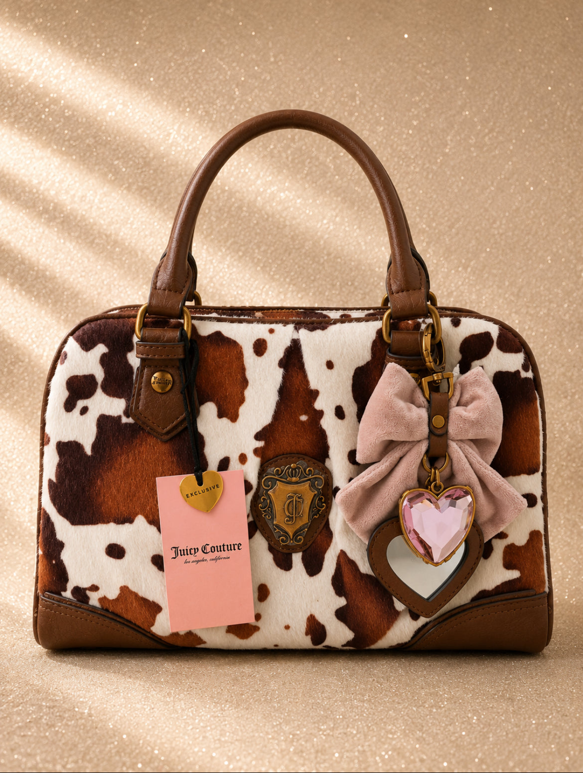 Чанта Juicy Couture Romance Cow Satchel с ефектен косъм с принт тип cow print