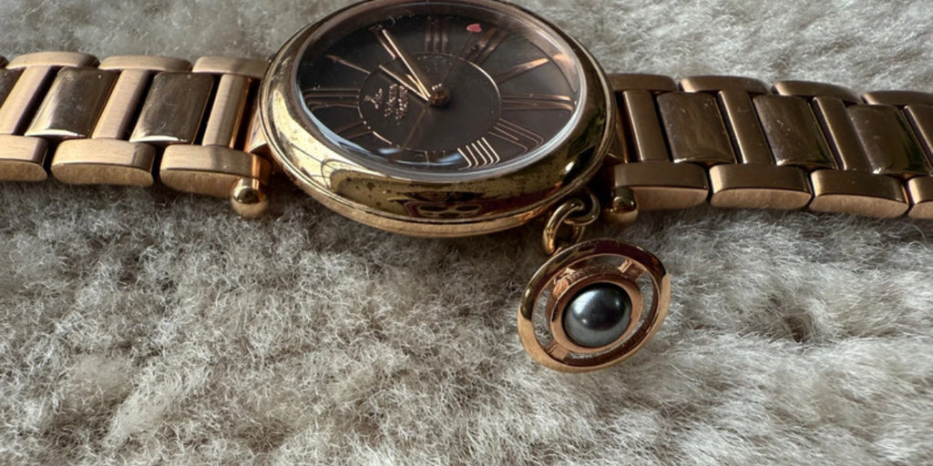 Vivienne Westwood Mother Orb часовник в rose-gold нюанс
